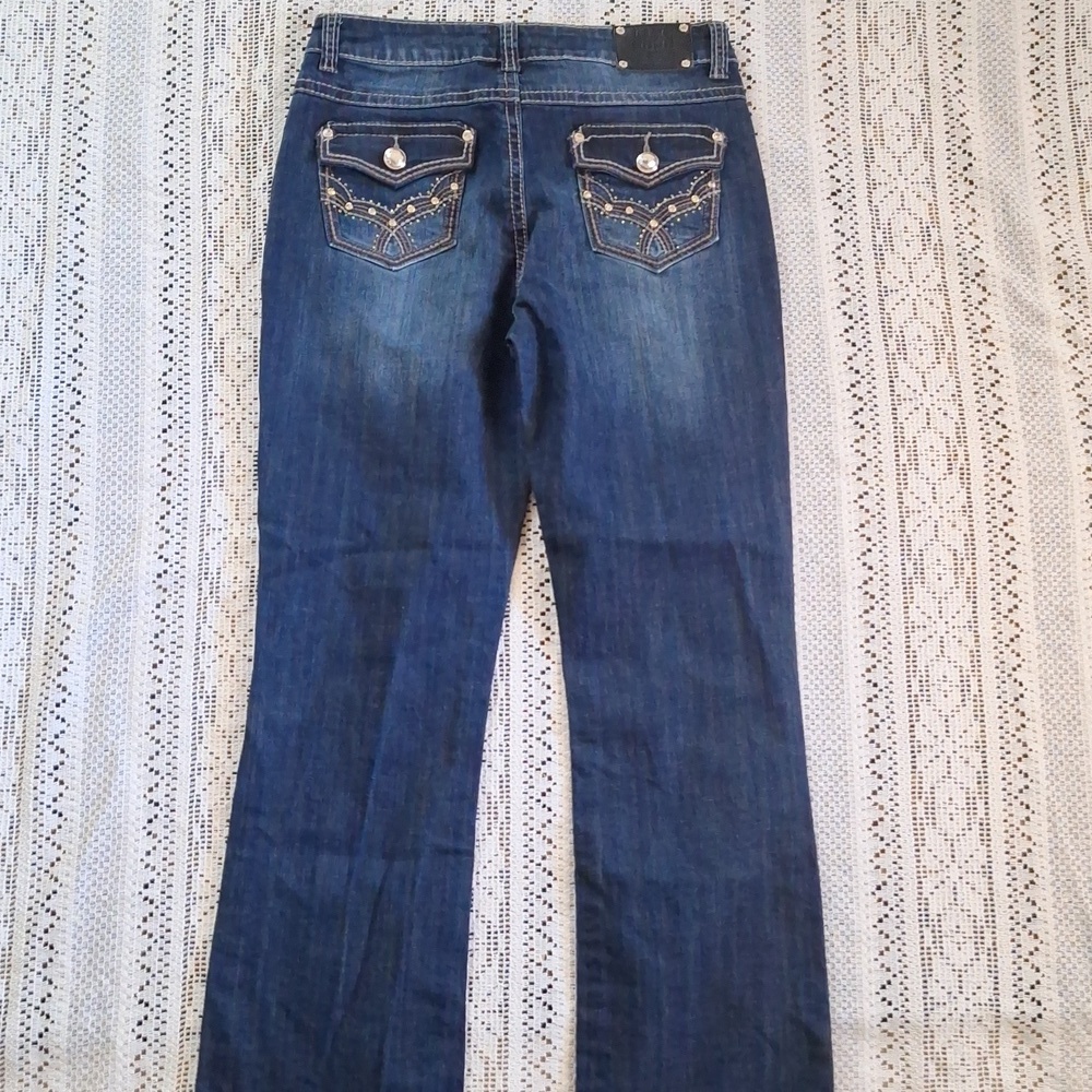 Live Hard Bling Flap Pocket Boot Cut Women’s Jeans